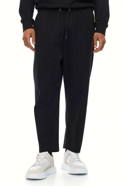 HIKARI Embossed Logo Sweatpants – Black