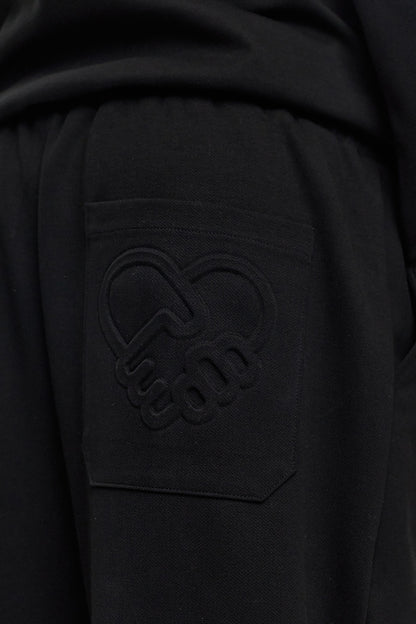 HIKARI Embossed Logo Sweatpants – Black